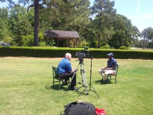 CBS 17 Interviews golf student on lawn
