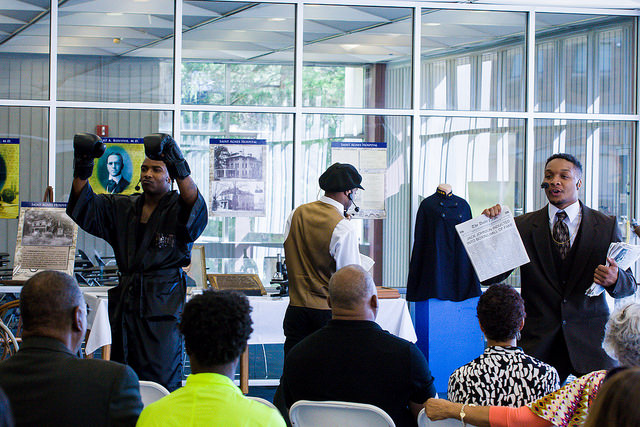 Students perform a scene about acclaimed boxer, Joe Johnson, who died at Saint Agnes Hospital, located on the campus of Saint Augustine's University